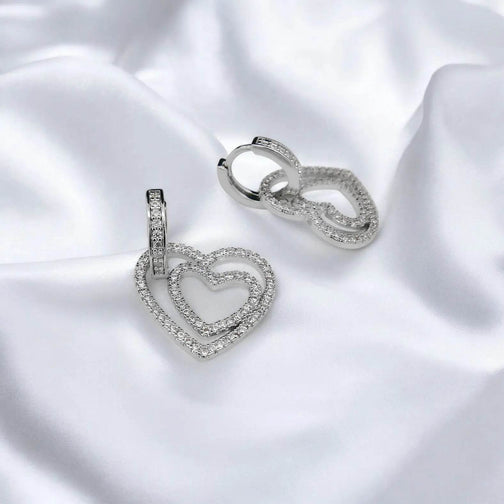 Zilverkleurige Linda hart oorbellen met zirkonia stenen - Victoria Valenza