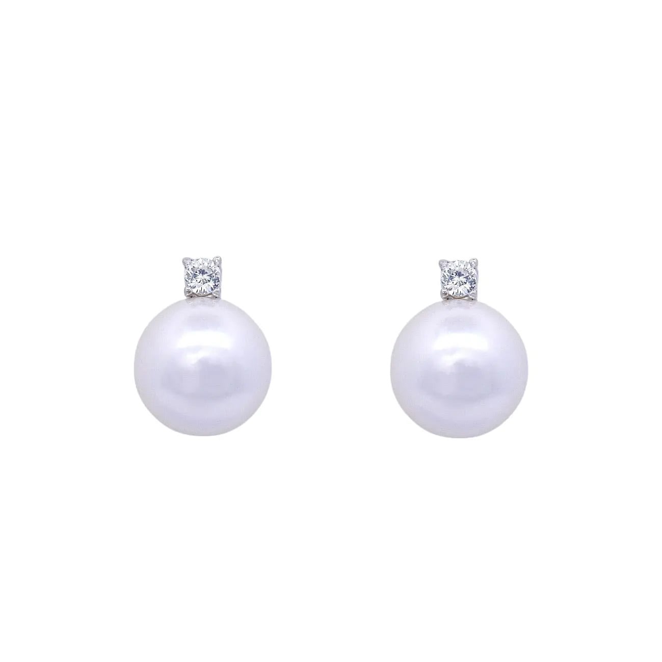 Zilveren clip oorbellen met parels 12 mm en zirkonia stenen.  Victoria Valenza