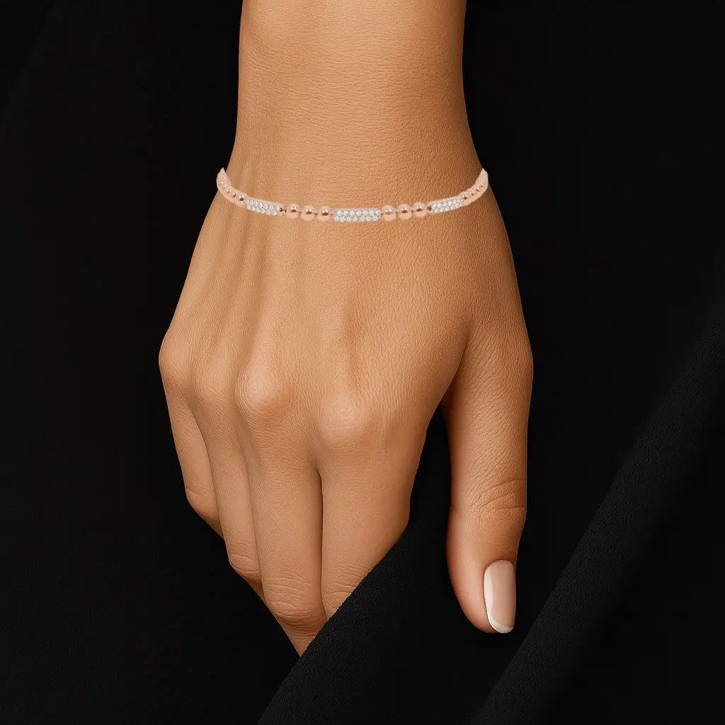 Roségoudkleurige bolletjes flexarmband met zirkonia stenen  Victoria Valenza