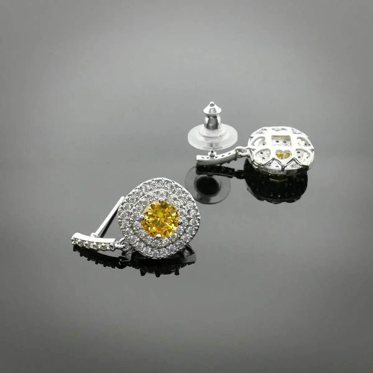 Zilverkleurige Entourage Oorbellen met Gele Zirkonia Stenen - Victoria Valenza