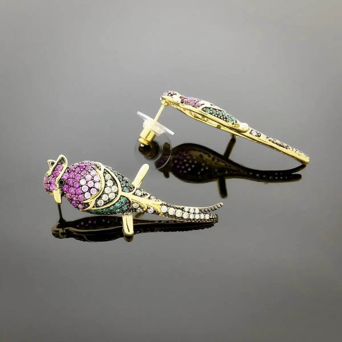 Goudkleurige vogel oorbellen met multicolor zirkonia's - Victoria Valenza