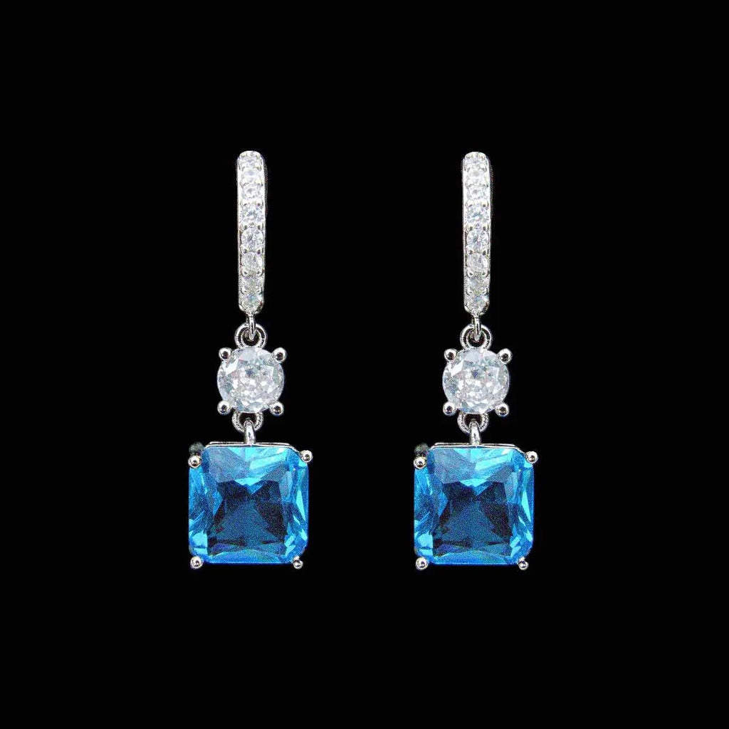 Verzilverde oorbellen met blauwe en witte zirkonia's Victoria Valenza