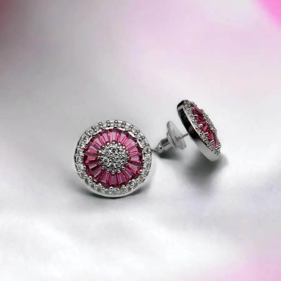 
                      
                        Zilverkleurige Coco oorknoppen met witte en roze zirkonia's - Victoria Valenza
                      
                    
