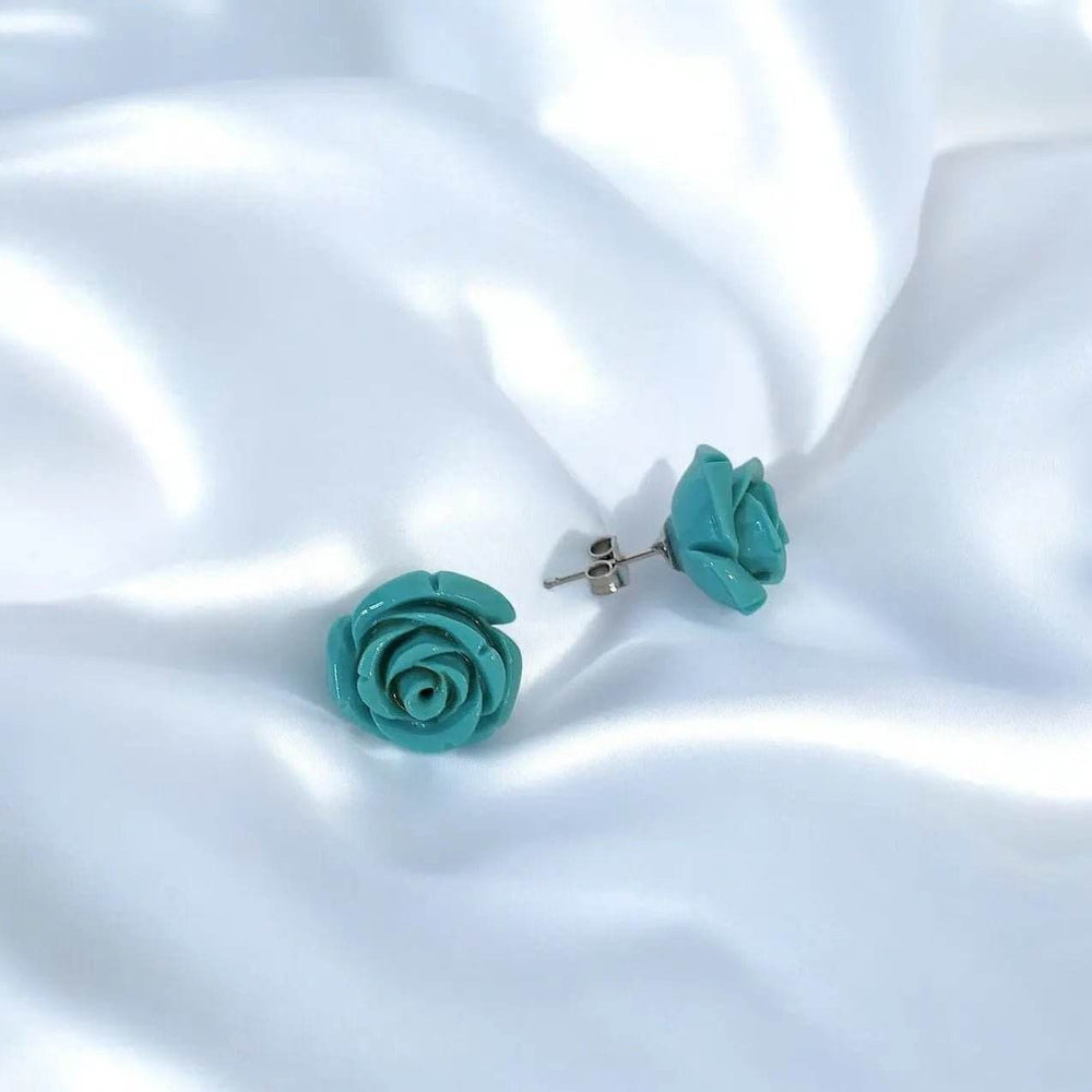 
                      
                        Zilveren oorbellen met turquoise roos - Victoria Valenza
                      
                    