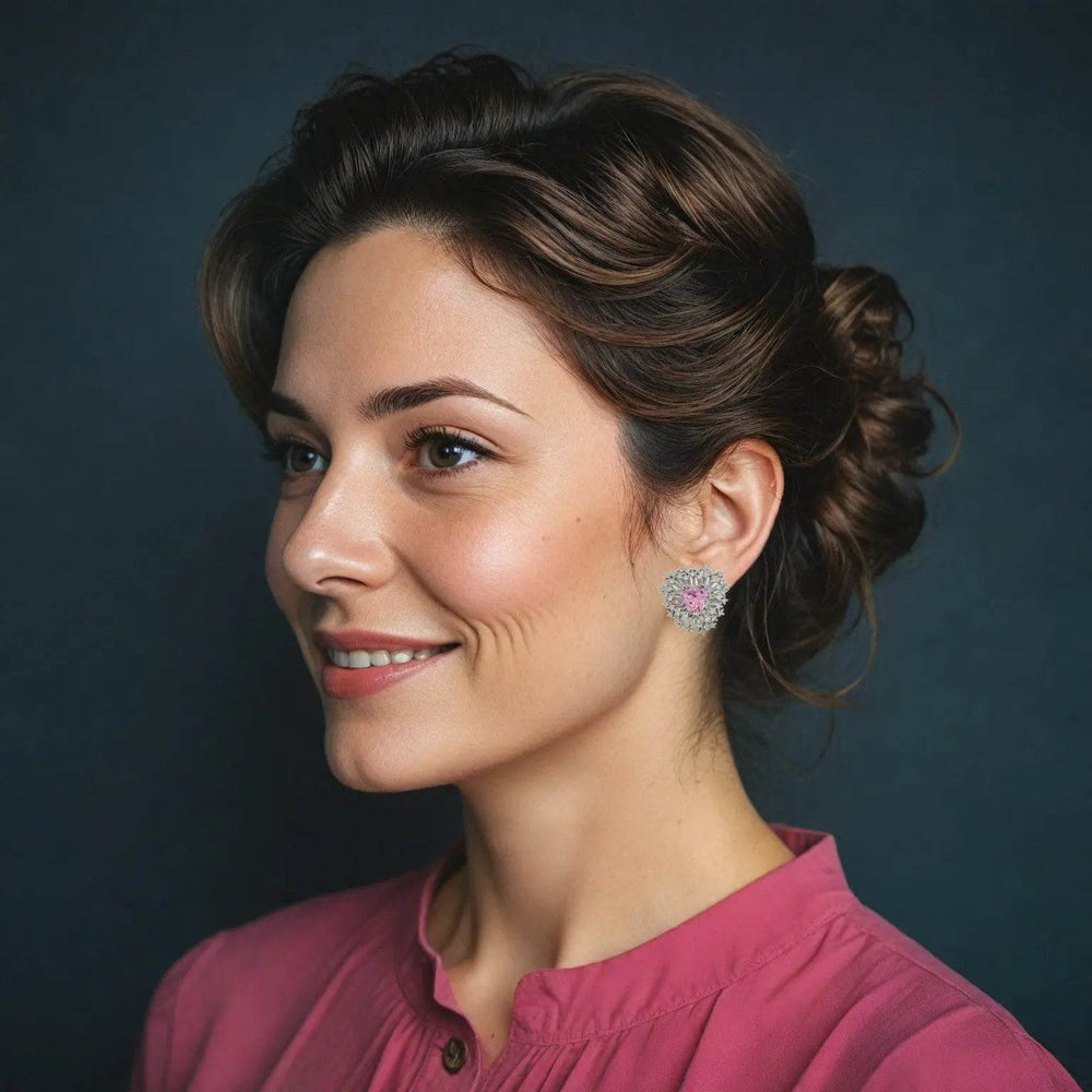 Zilverkleurige fantasie oorbellen met roze hart zirkonia stenen - Victoria Valenza