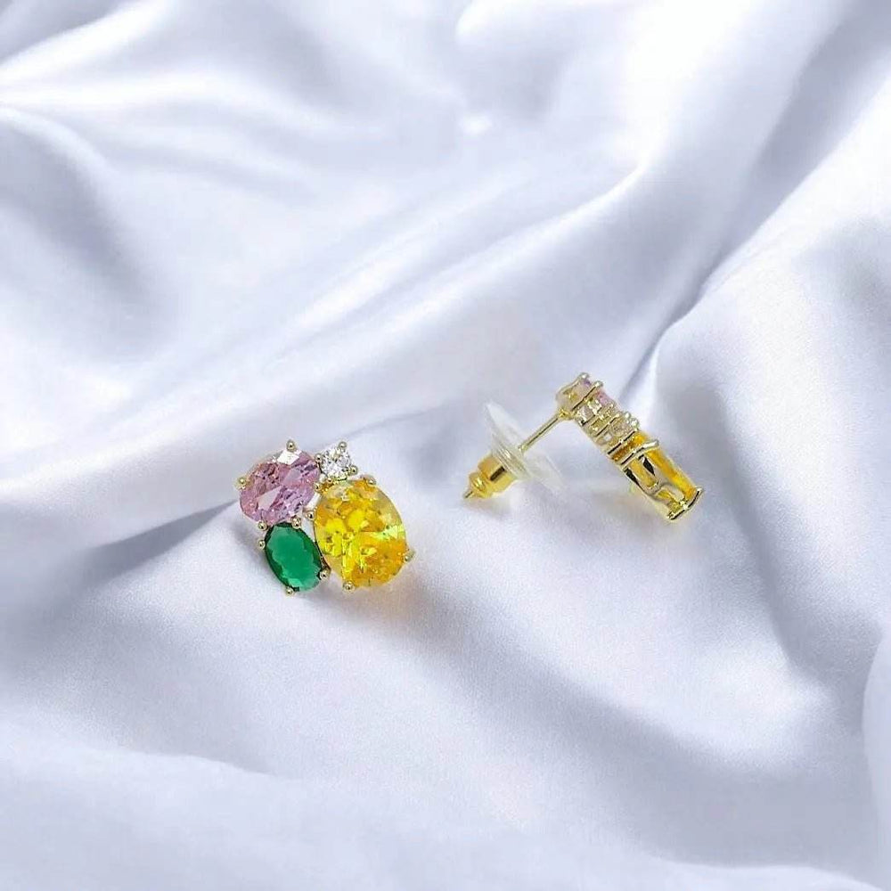 
                      
                        Goudkleurige tutti frutti oorbellen met zirkonia stenen - Victoria Valenza
                      
                    