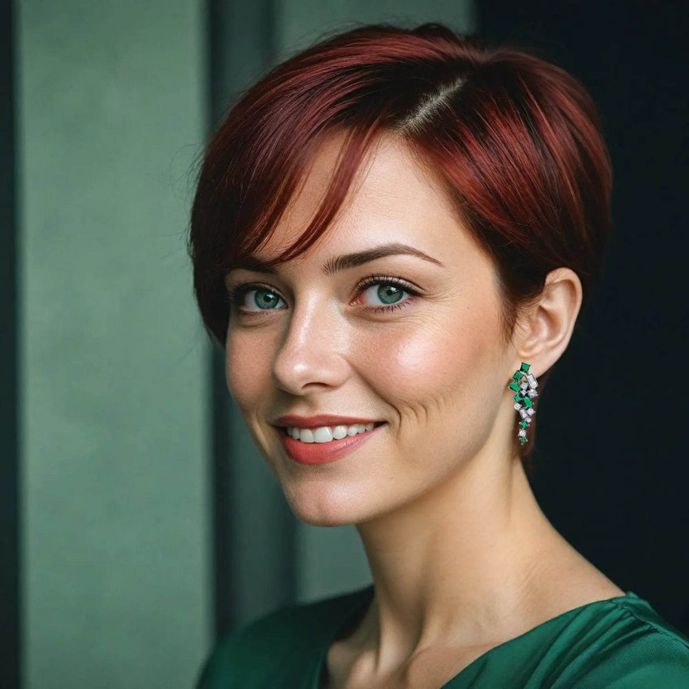 Zilverkleurige fantasie oorbellen met groene zirkonia stenen - Victoria Valenza