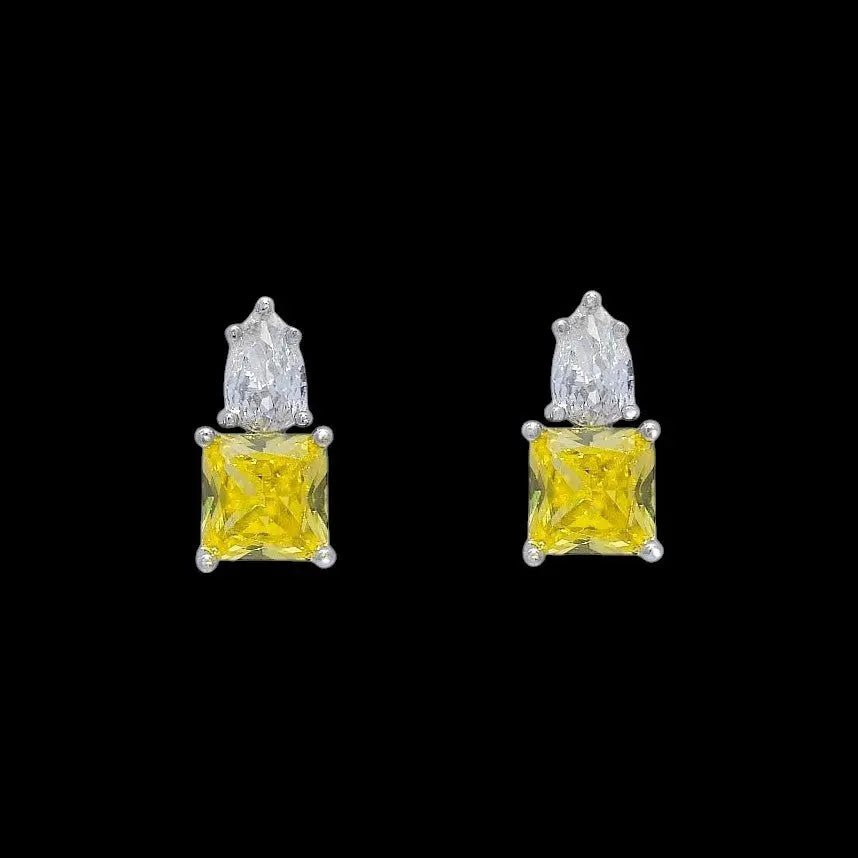 Zilverkleurige oorbellen met witte en gele zirkonia stenen  Victoria Valenza