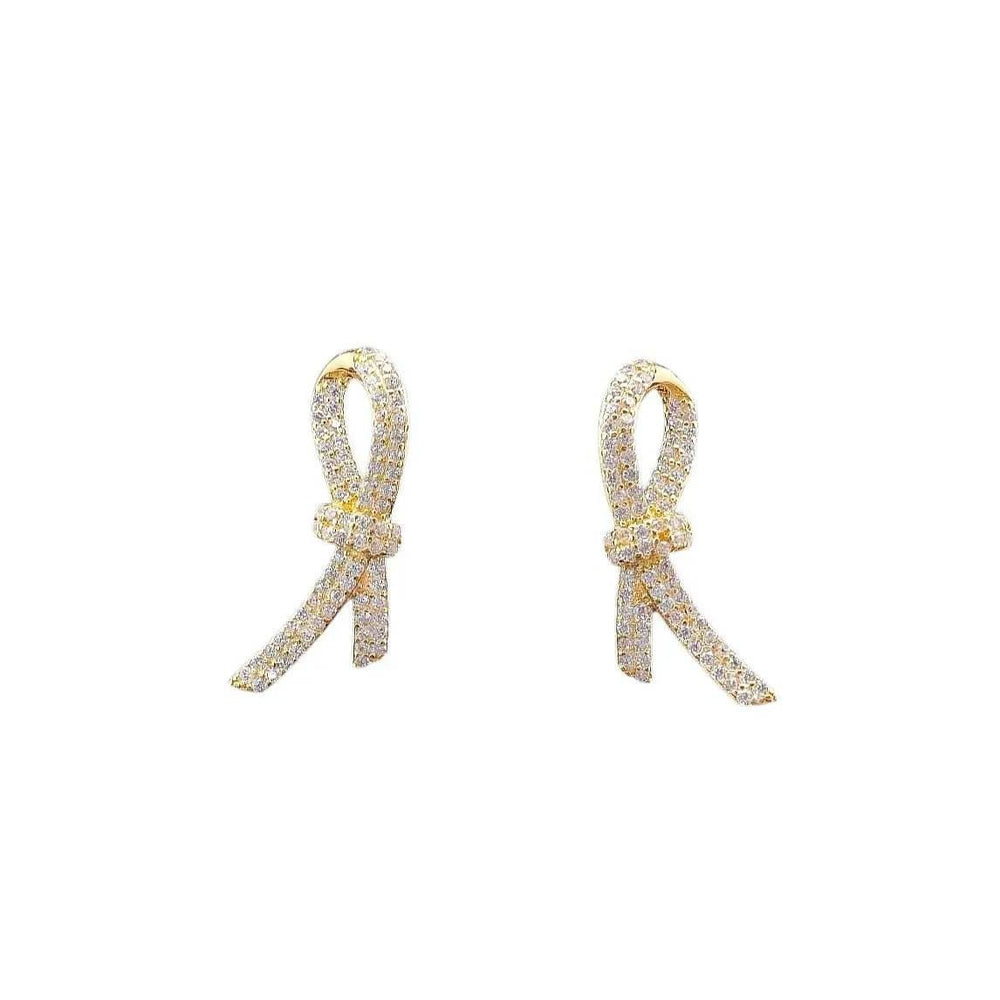 
                      
                        Vergulde zilveren ribbon oorbellen met zirkonia stenen - Victoria Valenza
                      
                    