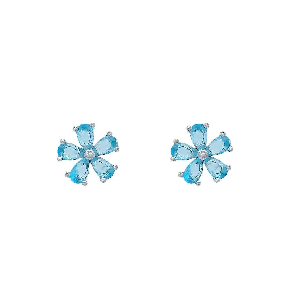 
                      
                        Zilverkleurige bloem oorbellen met blauwe zirkonia stenen - Victoria Valenza
                      
                    