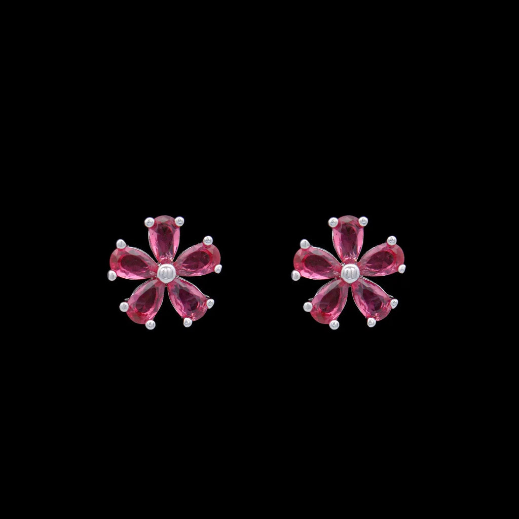 Zilverkleurige bloem oorbellen met roze zirkonia stenen  Victoria Valenza