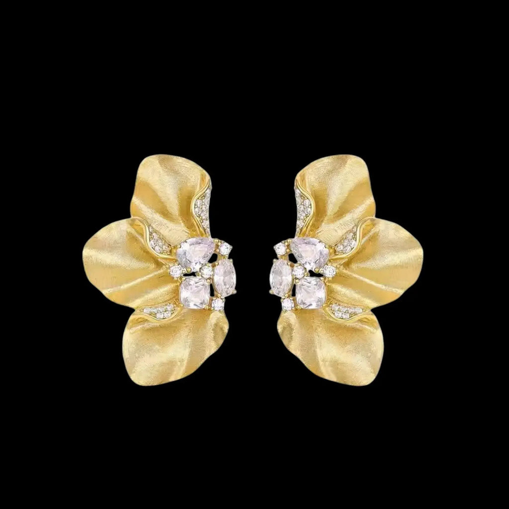 Vergulde lotus bloem oorbellen met zirkonia stenen  Victoria Valenza