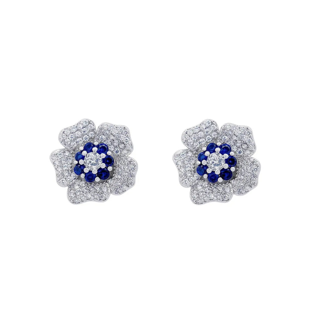 
                      
                        Zilverkleurige bloem oorbellen met blauwe en witte zirkonia stenen  Victoria Valenza
                      
                    