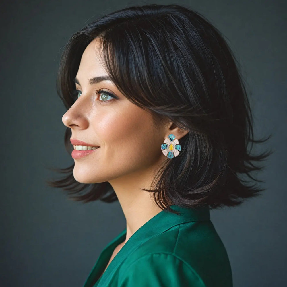 Vergulde druppel oorbellen met blauw-groene parelmoer en gele en witte zirkonia stenen  Victoria Valenza