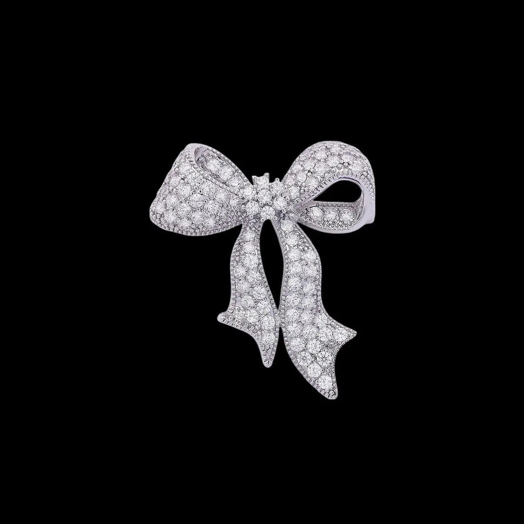 Zilverkleurige strik broche met zirkonia stenen  Victoria Valenza