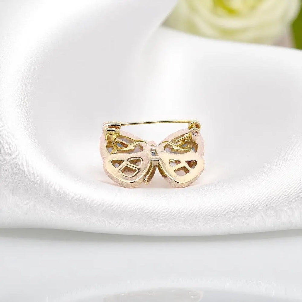 
                      
                        Goudkleurige vlinder broche met parelmoer en zirkonia stenen  Victoria Valenza
                      
                    