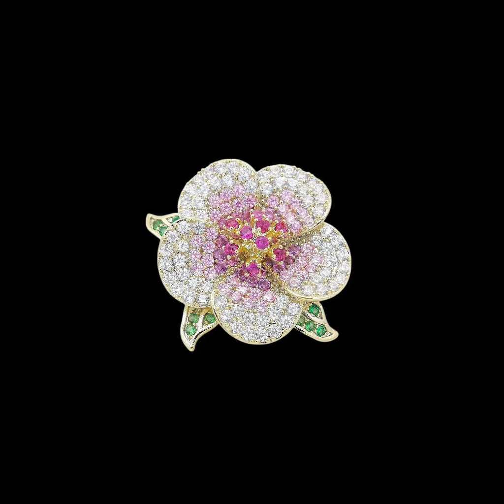 Goudkleurige sakura broche met mulricolor zirkonia stenen  Victoria Valenza