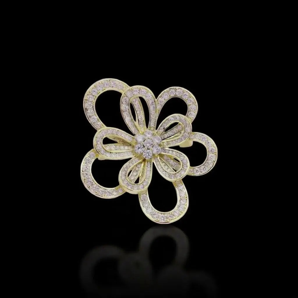 Goudkleurige cosmosbloem broche en hanger met gefacetteerde zirkonia stenen | Victoria Valenza