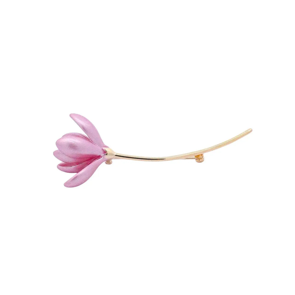 
                      
                        Goudekleurige krokusbloem broche met roze emaille  Victoria Valenza
                      
                    