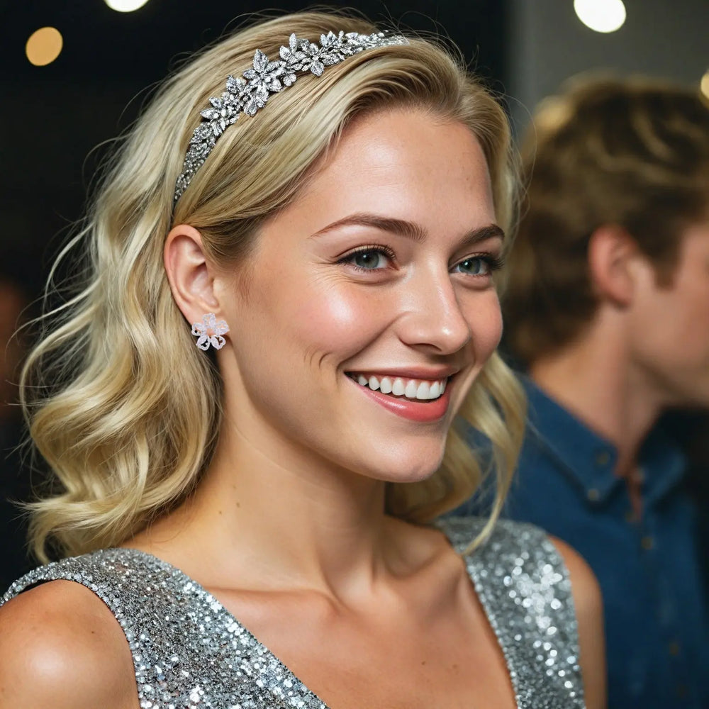 Zilverkleurige ajour bloem oorbellen met clipsen en zirkonia stenen  Victoria Valenza