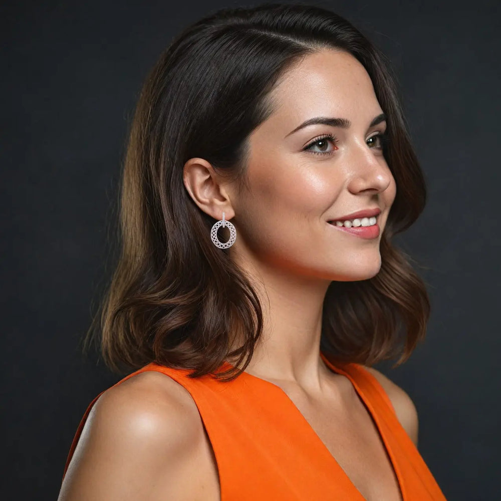 Zilverkleurige ovale matte oorbellen met zirkonia stenen  Victoria Valenza
