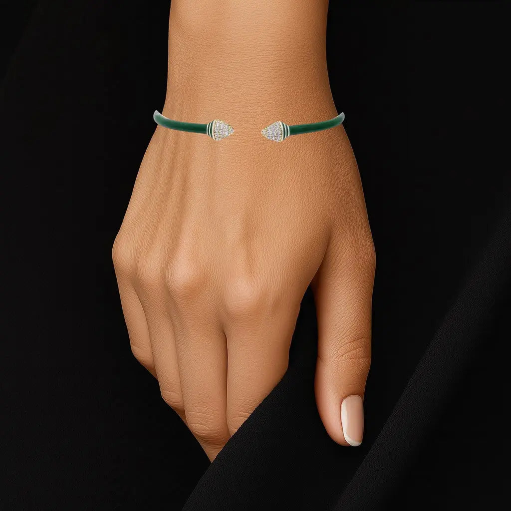 Goudkleurige armband met groene emaille en zirkonia stenen  Victoria Valenza