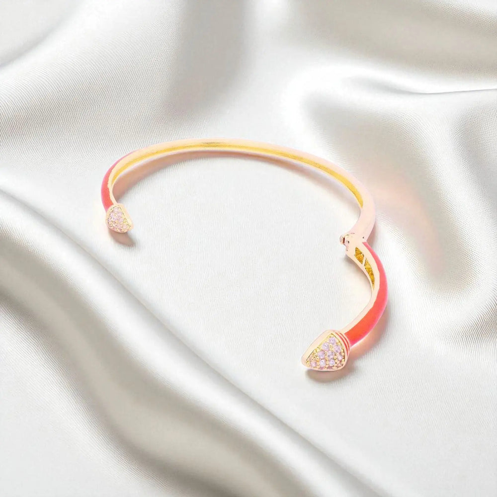 
                      
                        Goudkleurige armband met oranje emaille en zirkonia stenen  Victoria Valenza
                      
                    