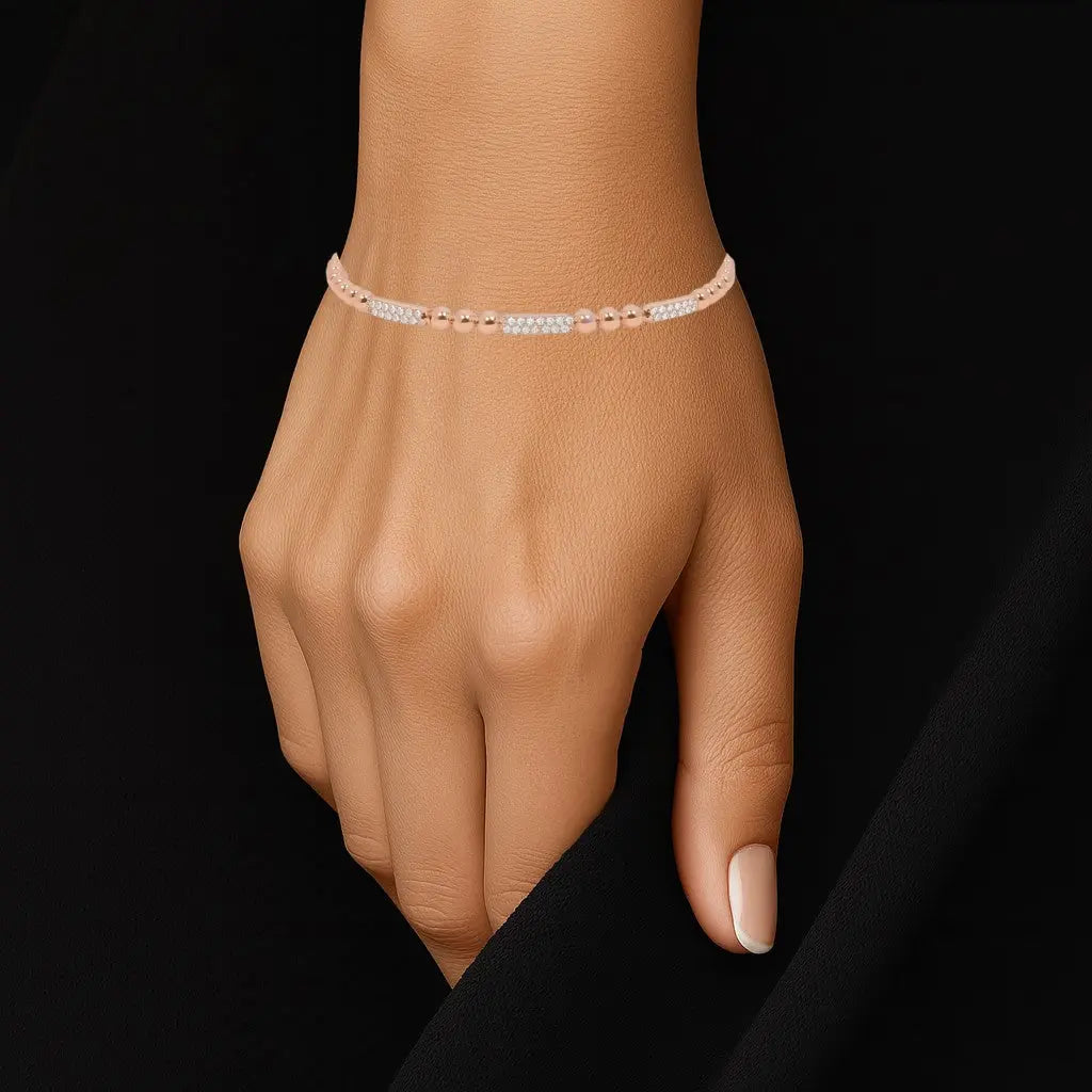 Roségoudkleurige bolletjes flexarmband met zirkonia stenen  Victoria Valenza