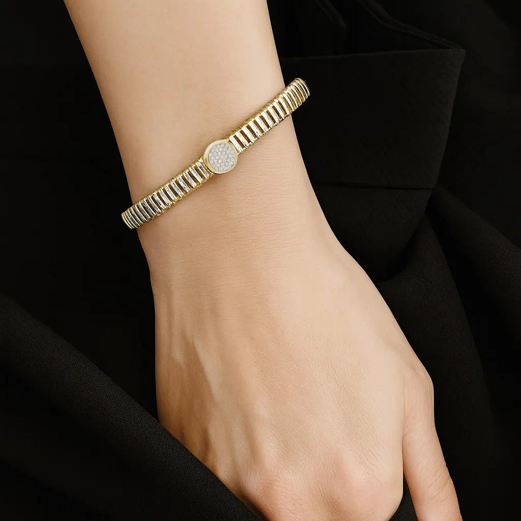 Goudkleurige opengewerkte armband met pavé zirkonia stenen  Victoria Valenza