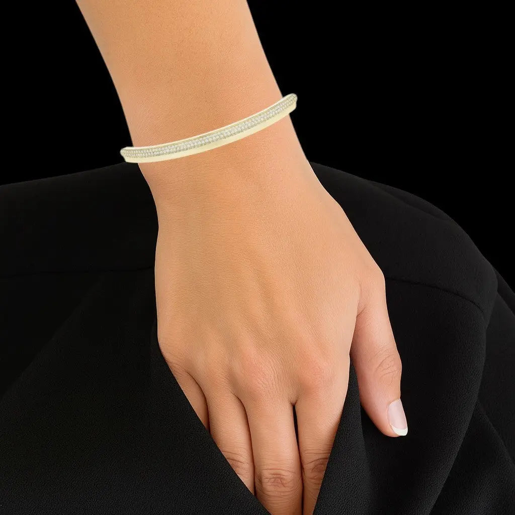 Goudkleurige armband met pavé zirkonia stenen  Victoria Valenza