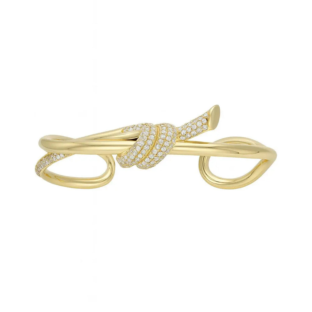 
                      
                        Goudkleurige knot armband met zirkonia stenen  Victoria Valenza
                      
                    