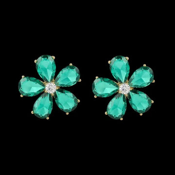 Goudkleurige bloem oorbellen met groene zirkonia stenen  Victoria Valenza