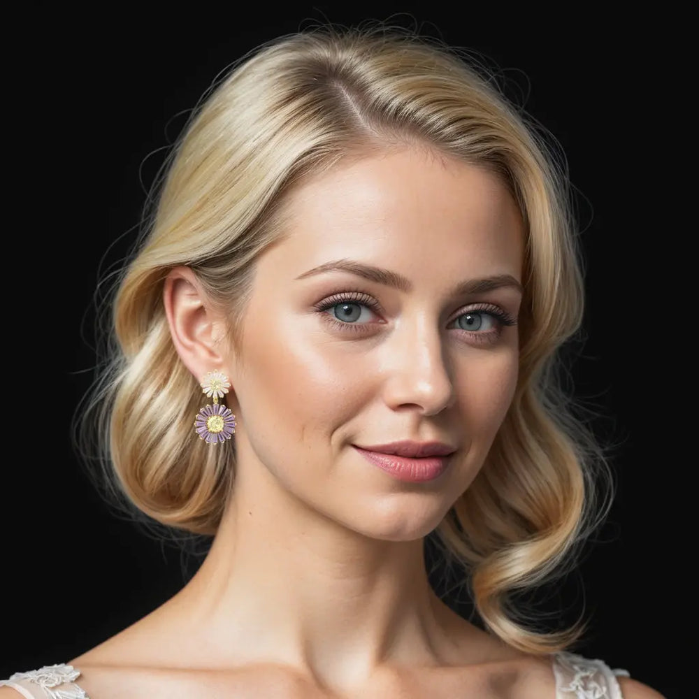 Goudkleurige Daisy oorbellen met paarse en gele zirkonia stenen  Victoria Valenza