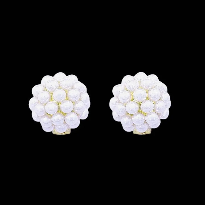 Goudkleurige Celeste clip oorbellen met parels  Victoria Valenza