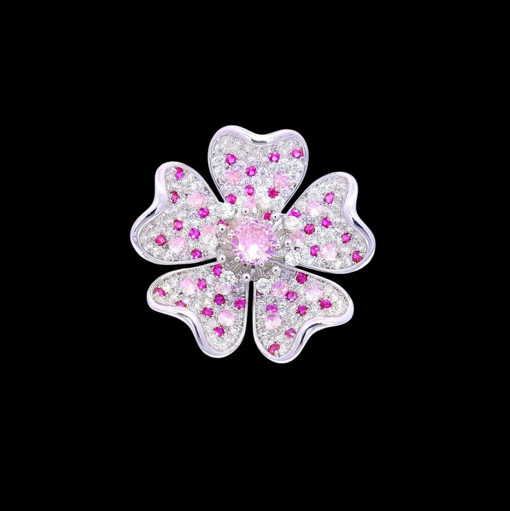 Zilverkleurige sakura bloem broche met pavé roze en witte zirkonia stenen  Victoria Valenza