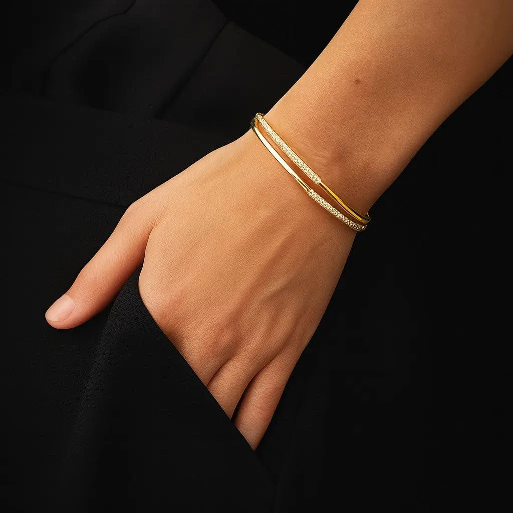 Goudkleurige opengewerkte armband met pavé zirkonia stenen  Victoria Valenza