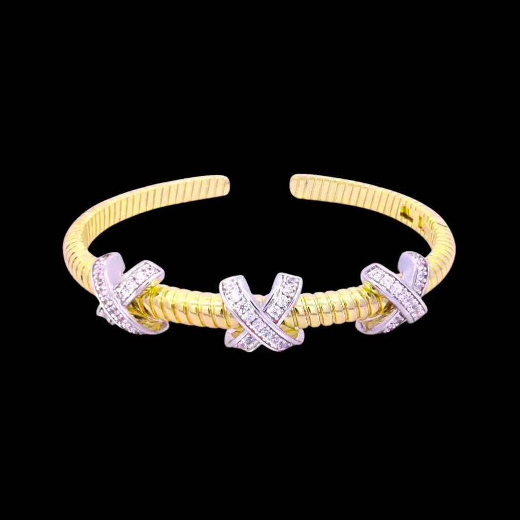 Bicolor tors armband met X motief en zirkonia stenen  Victoria Valenza