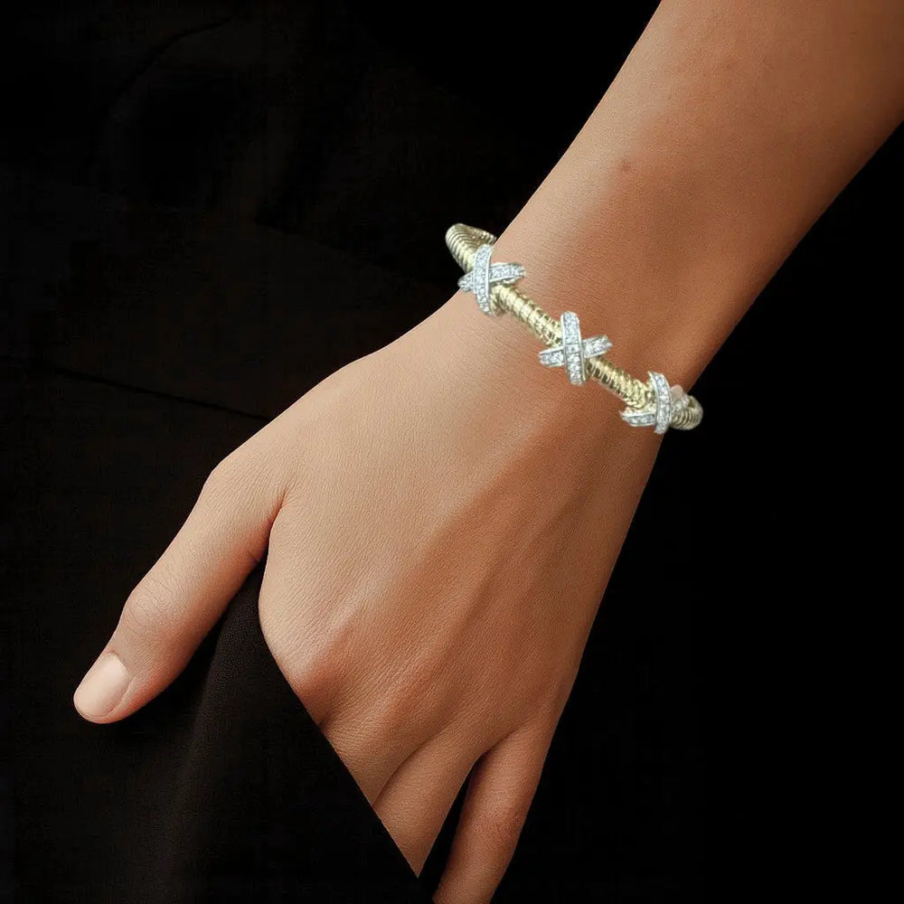Bicolor tors armband met X motief en zirkonia stenen  Victoria Valenza