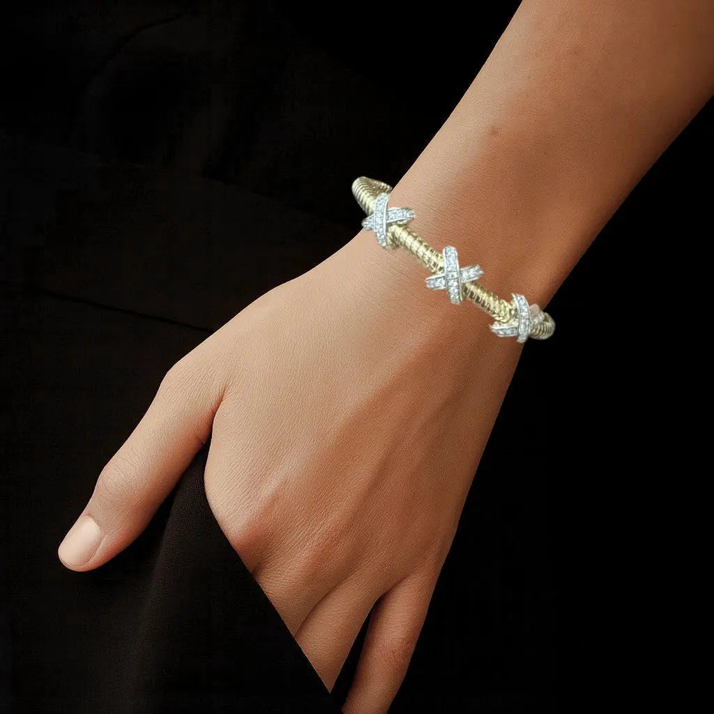Bicolor tors armband met X motief en zirkonia stenen  Victoria Valenza