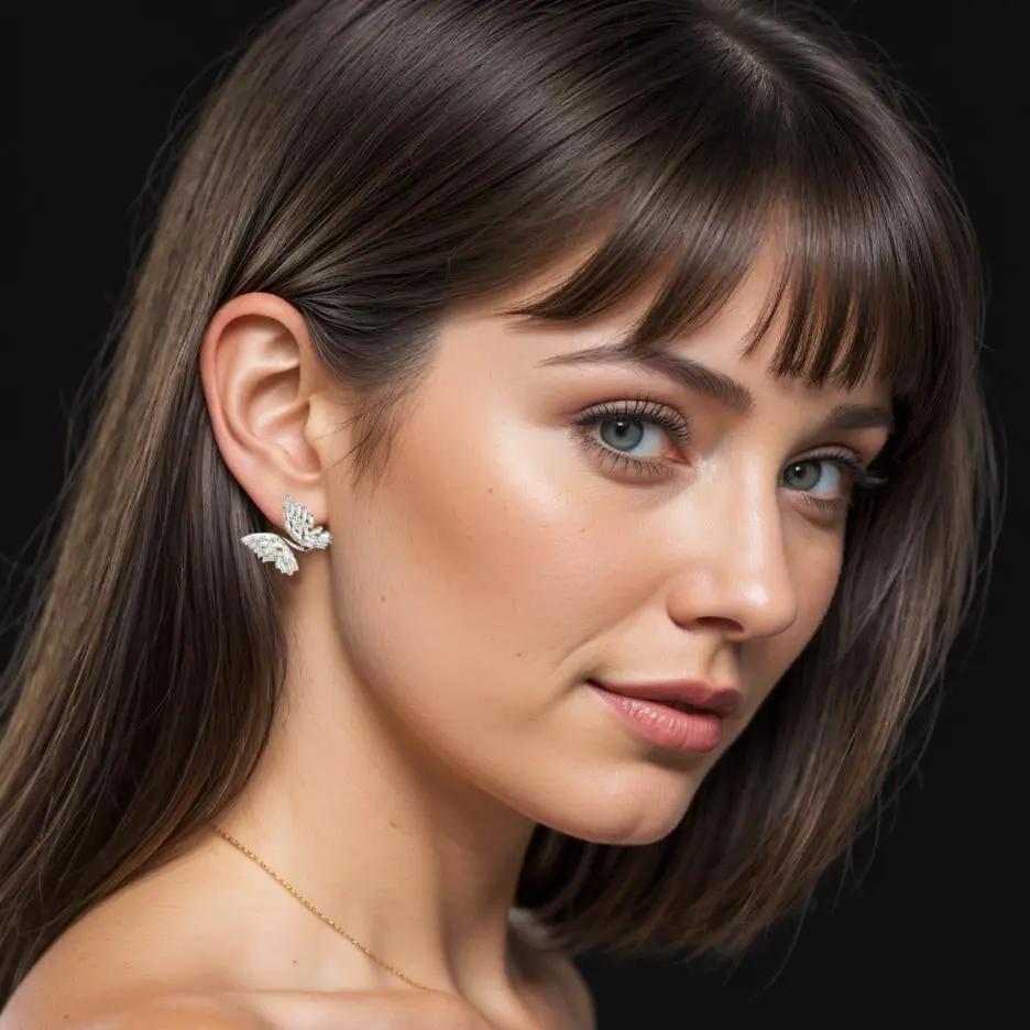 Zilverkleurige vlinder oorbellen met zirkonia stenen  Victoria Valenza