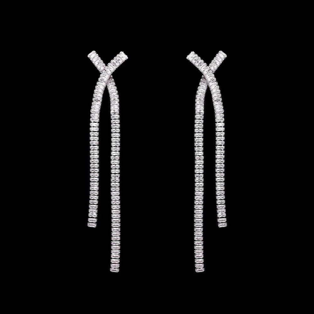 Zilverkleurige Y-vorm oorbellen met zirkonia stenen  Victoria Valenza