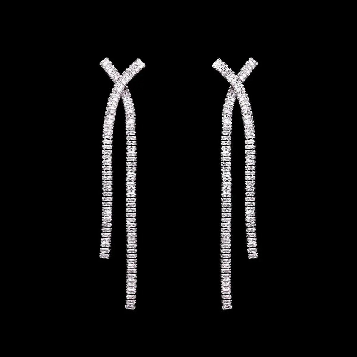 Zilverkleurige Y-vorm oorbellen met zirkonia stenen  Victoria Valenza
