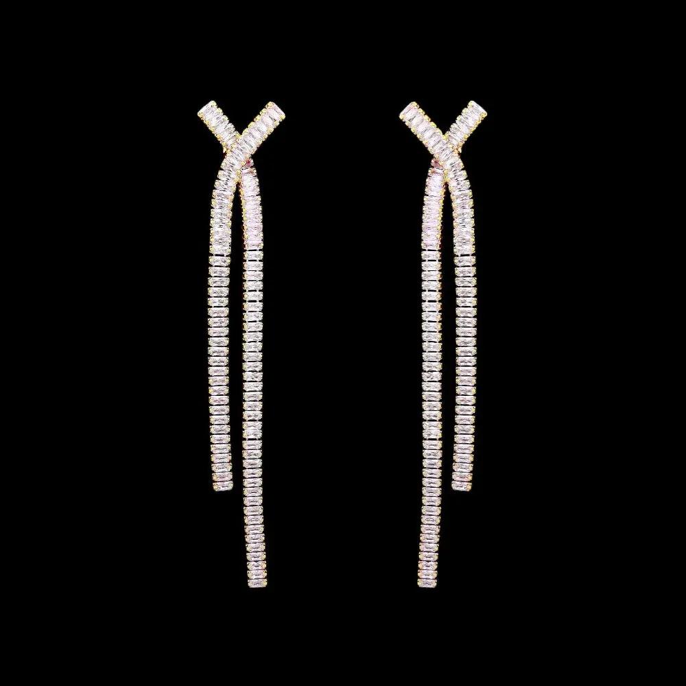 Goudkleurige Y-vorm oorbellen met zirkonia stenen  Victoria Valenza