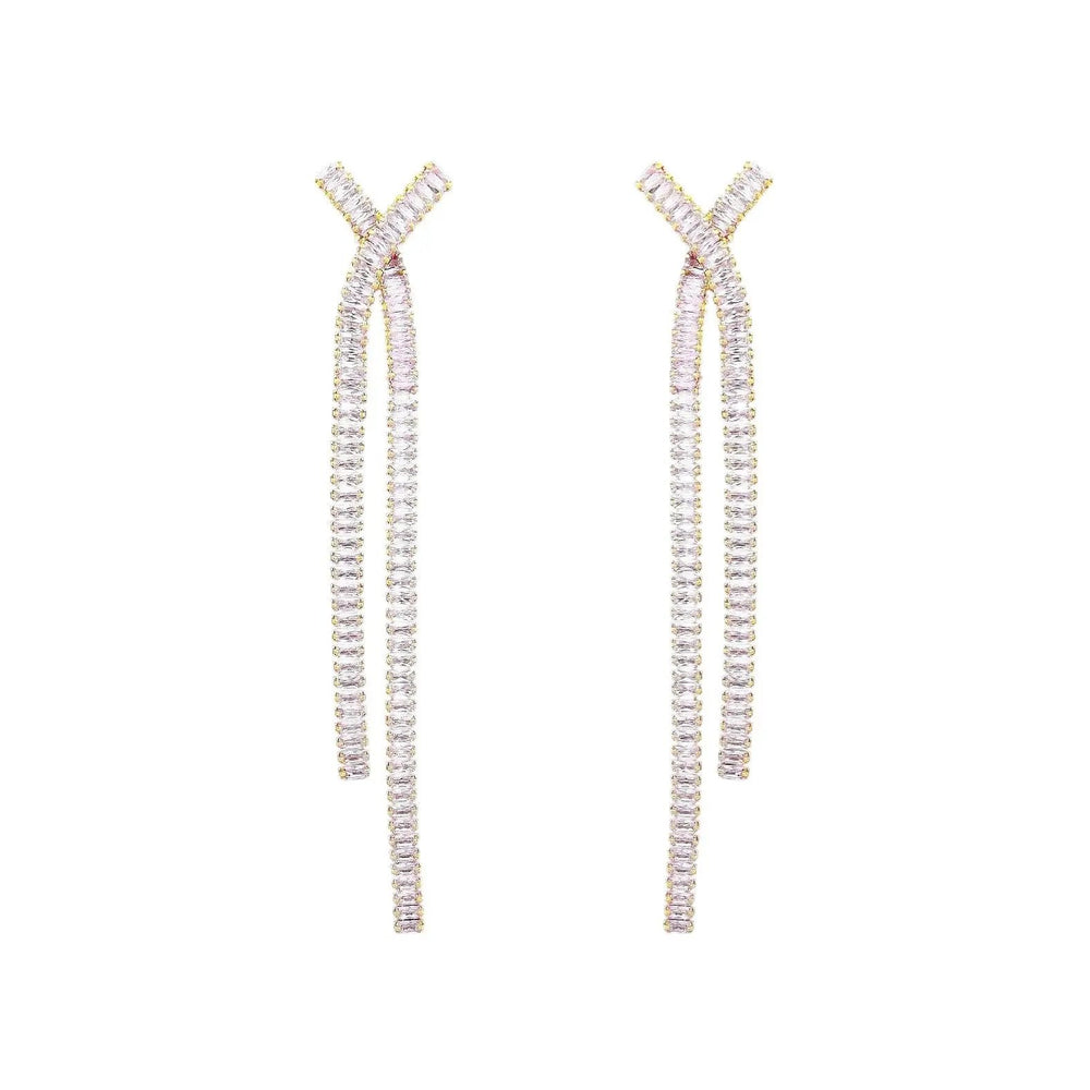 
                      
                        Goudkleurige Y-vorm oorbellen met zirkonia stenen  Victoria Valenza
                      
                    