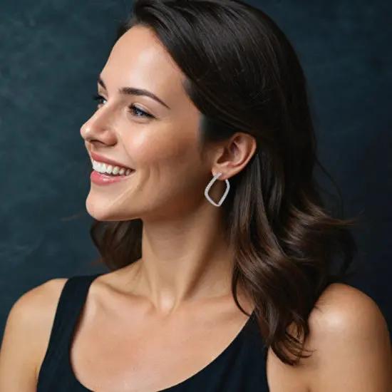 Zilverkleurige ruit oorbellen met zirkonia stenen  Victoria Valenza