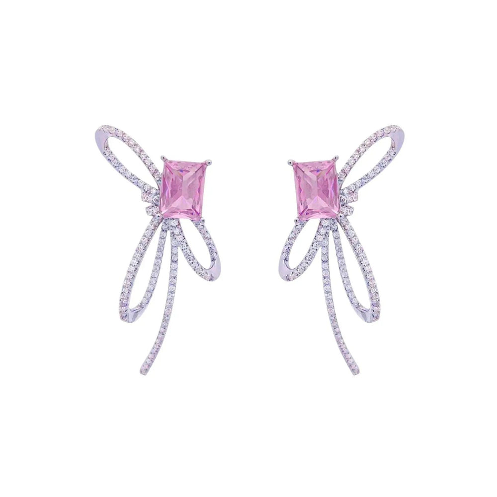 
                      
                        Zilverkleurige strik oorbellen met roze zirkonia stenen  Victoria Valenza
                      
                    