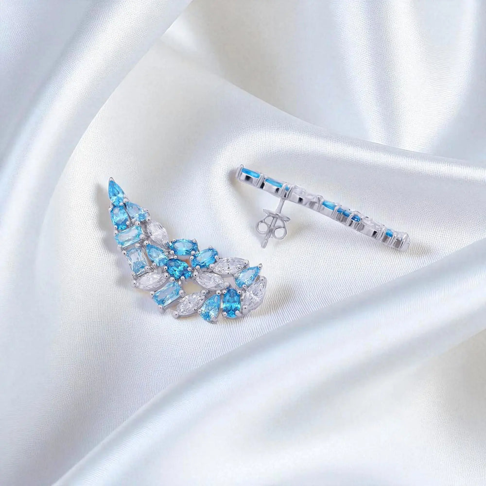 
                      
                        Zilveren luxe oorbellen met blauwe zirkonia stenen  Victoria Valenza
                      
                    