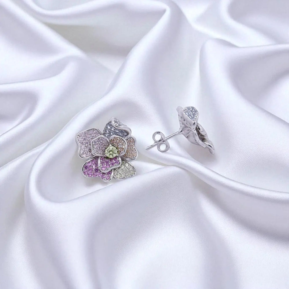 
                      
                        Zilveren bloem oorbellen met multicolor zirkonia stenen  Victoria Valenza
                      
                    