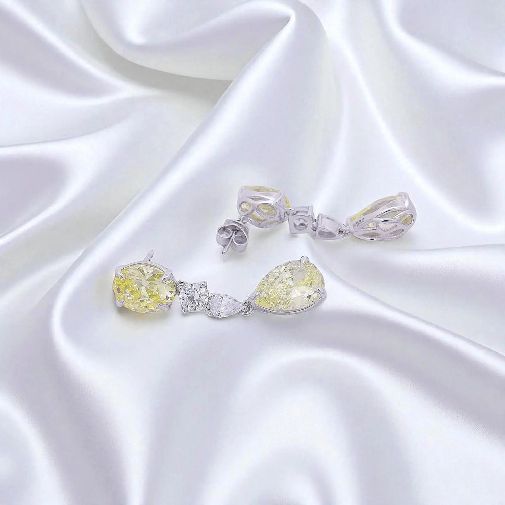 
                      
                        Zilveren statement oorbellen met gele zirkonia stenen  Victoria Valenza
                      
                    