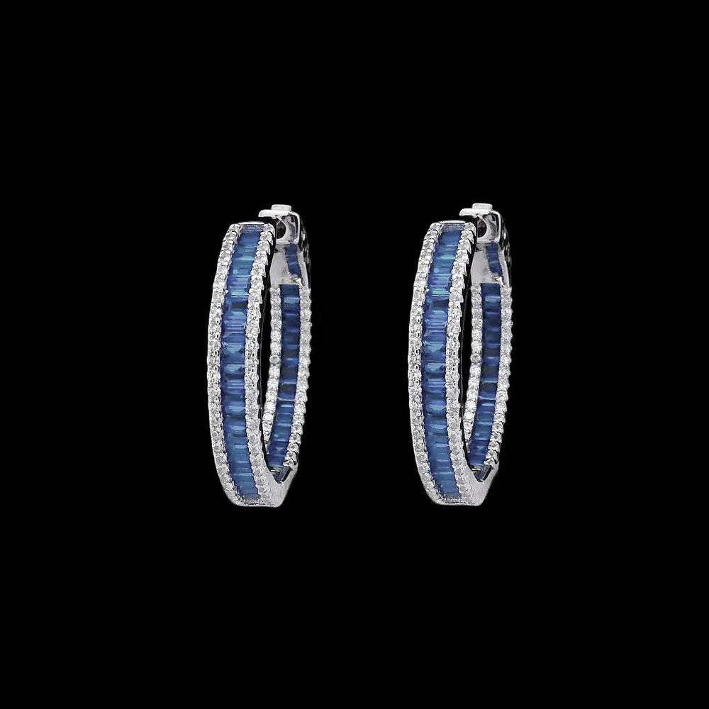 Zilveren creolen met blauwe zirkonia stenen  Victoria Valenza